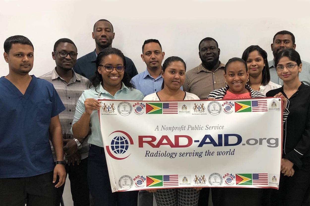 Nine radiology residents from Guyana standing in a group