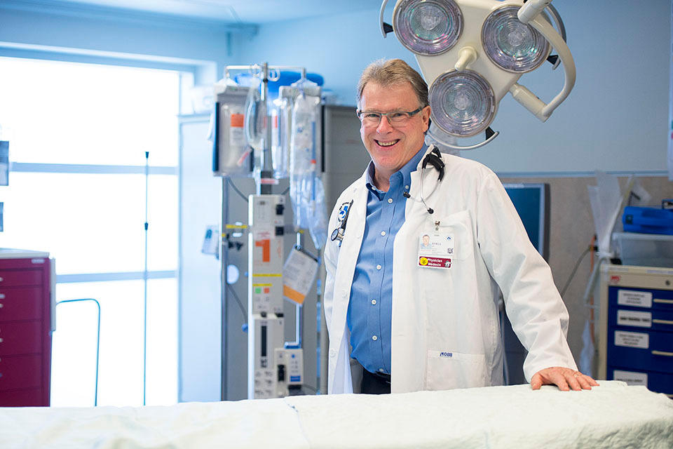 Dr. Stiell in a hospital room.