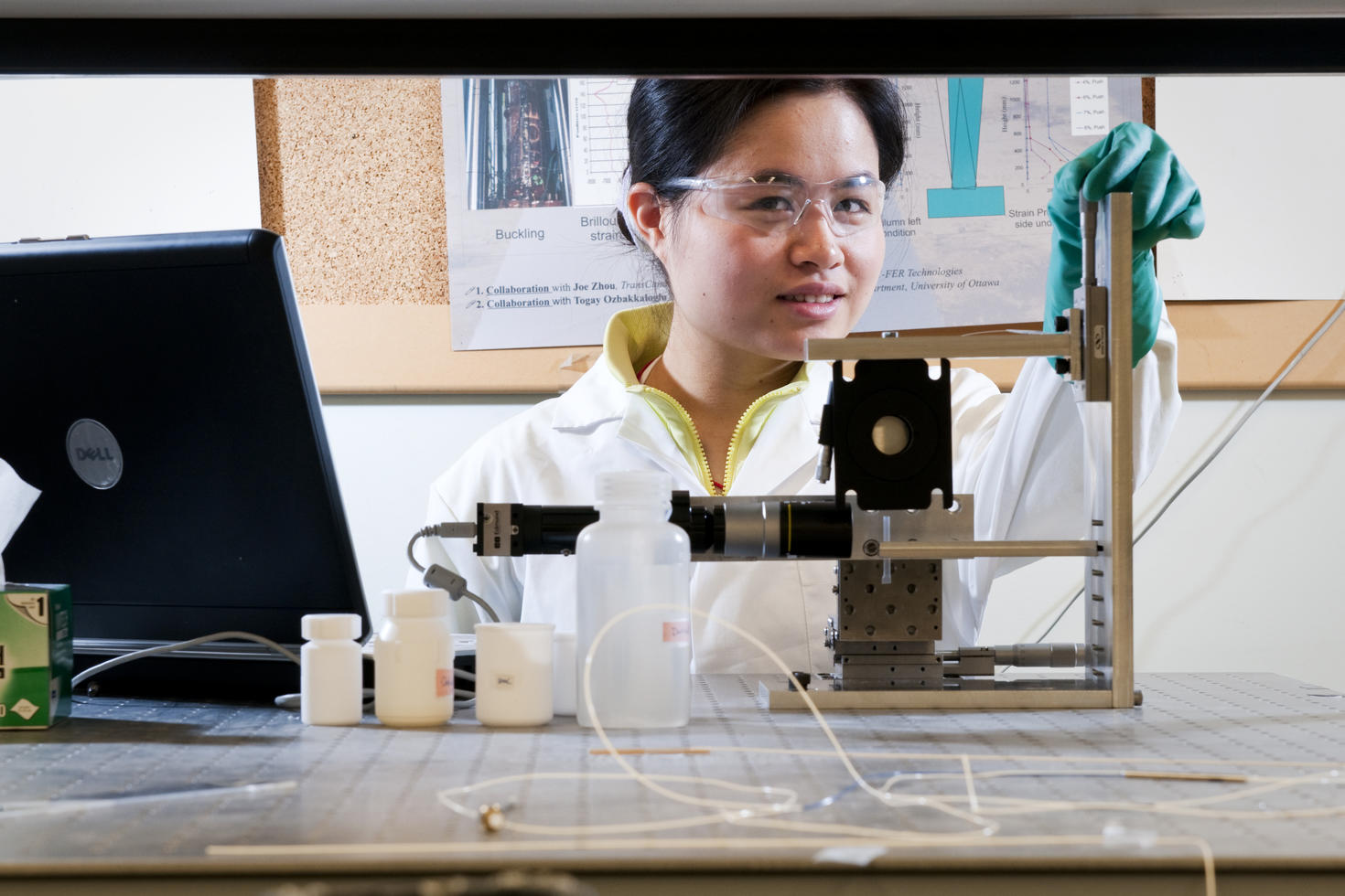female student in a physics lab