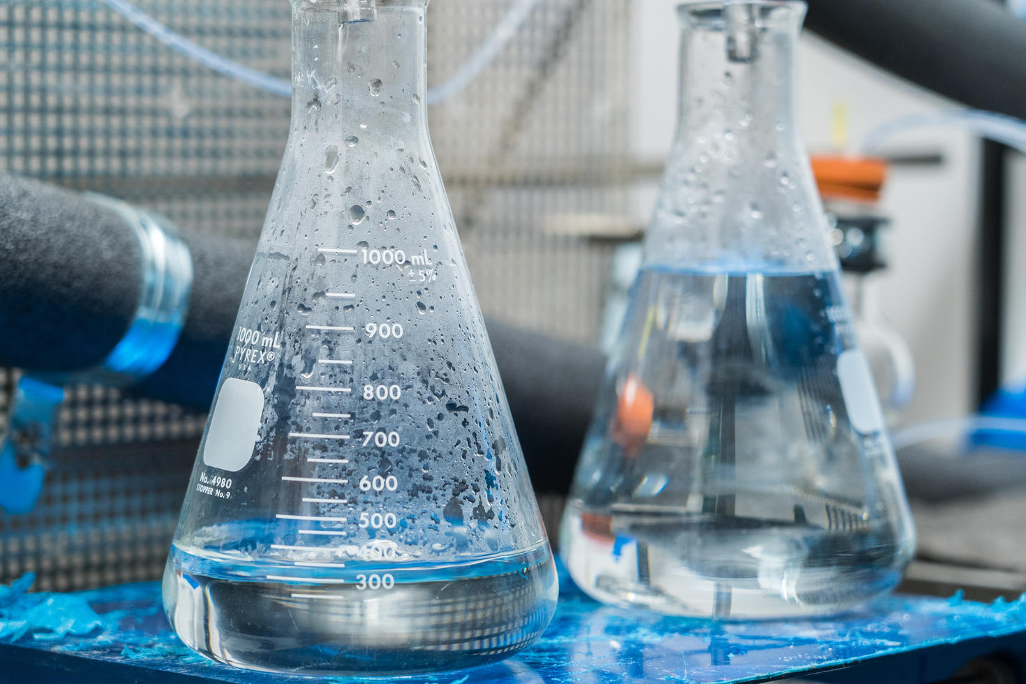 Close up on beakers full on liquid