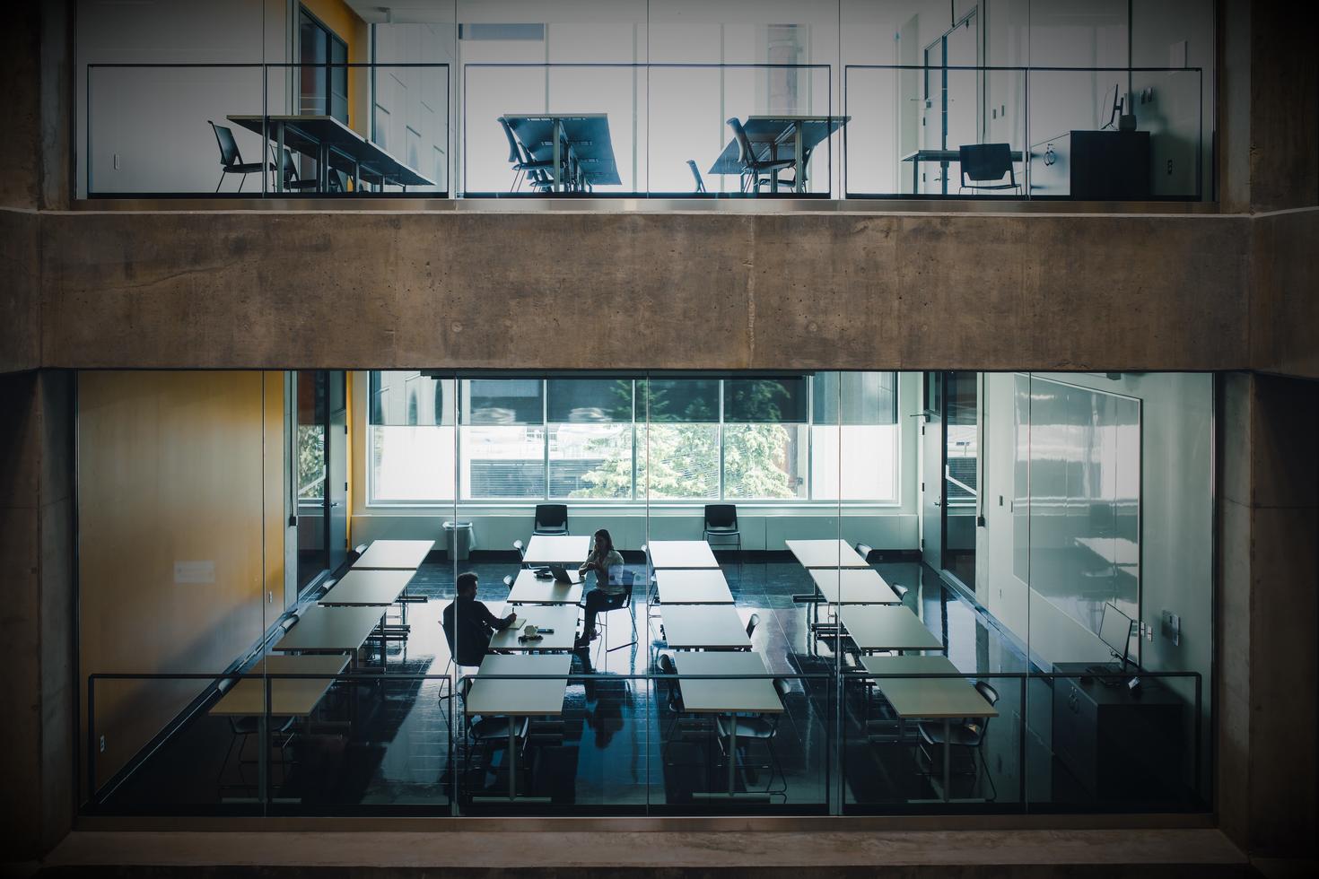 View of a classroom through a wall of glass