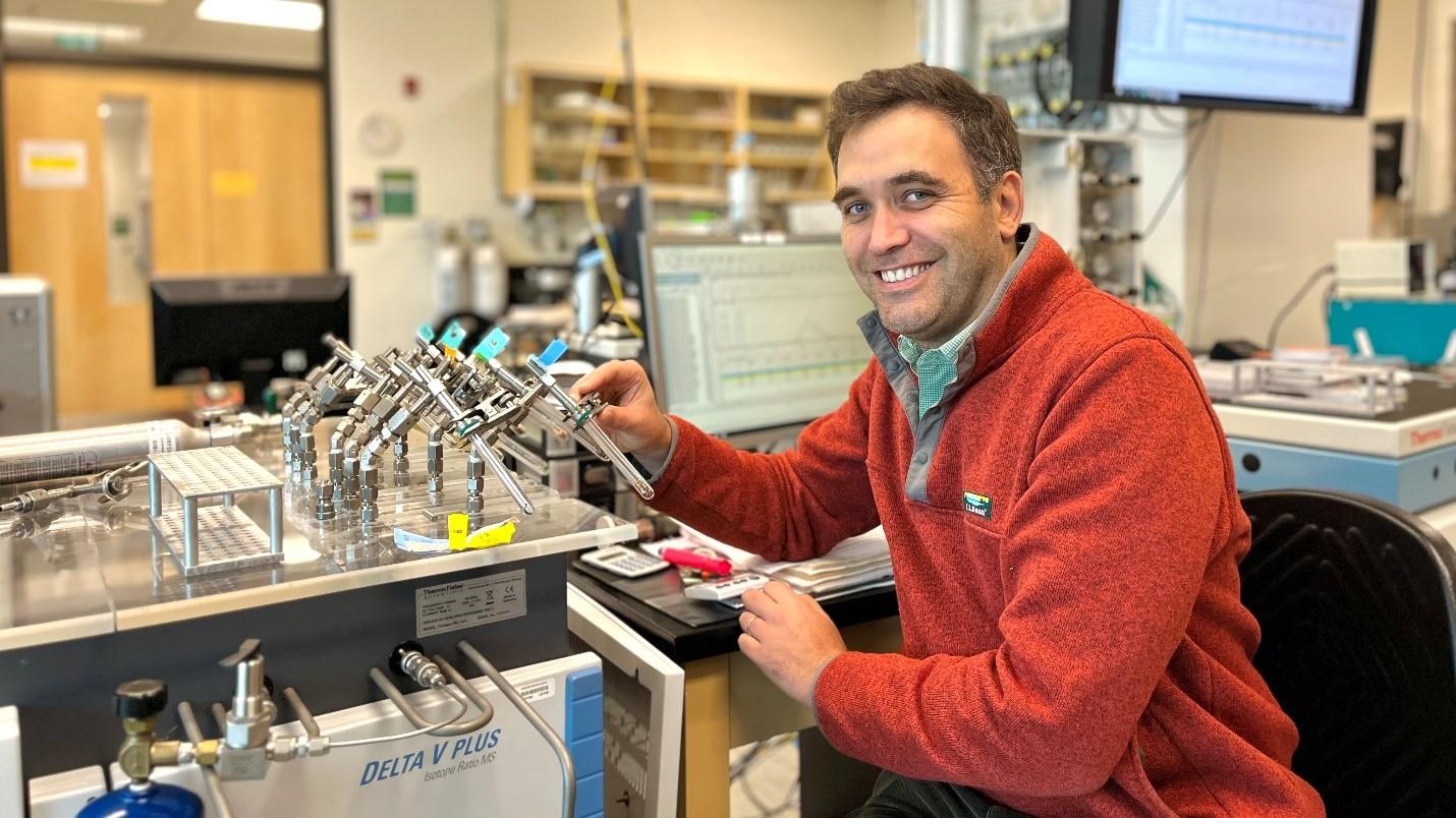 Professor Clément Bataille is seen manipulating an Isotope Ratio Mass Spectrometer in the Jan Veizer Stable Isotope Laboratory