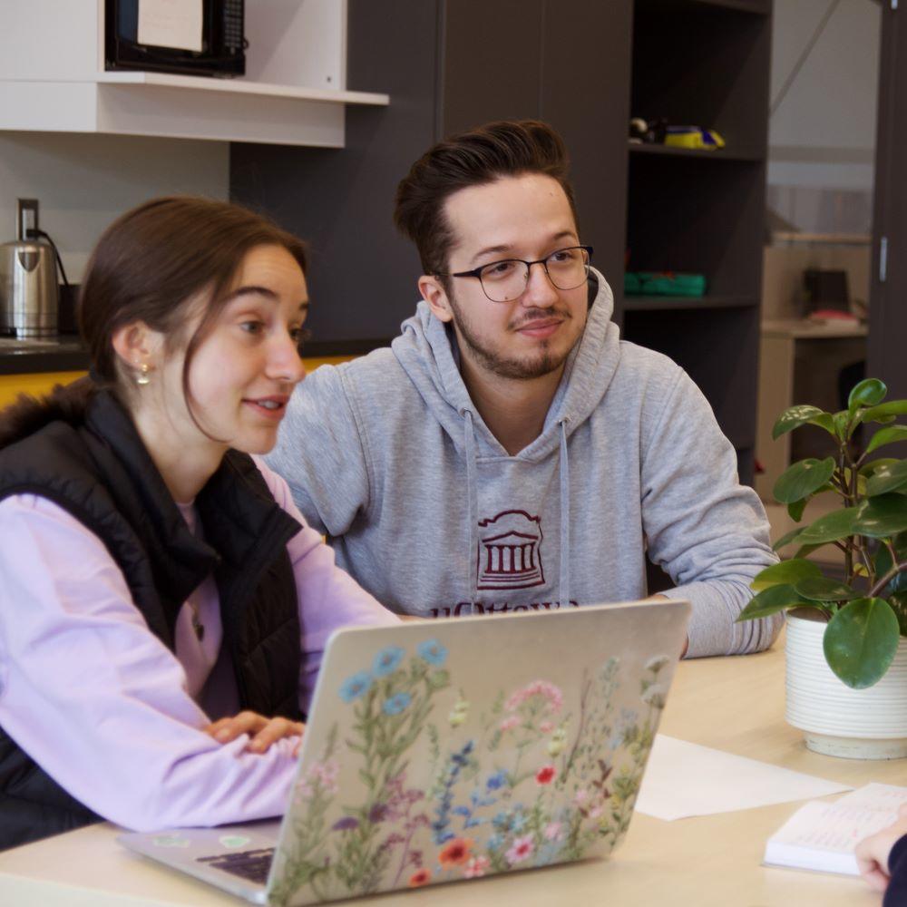 Two student mentors talking