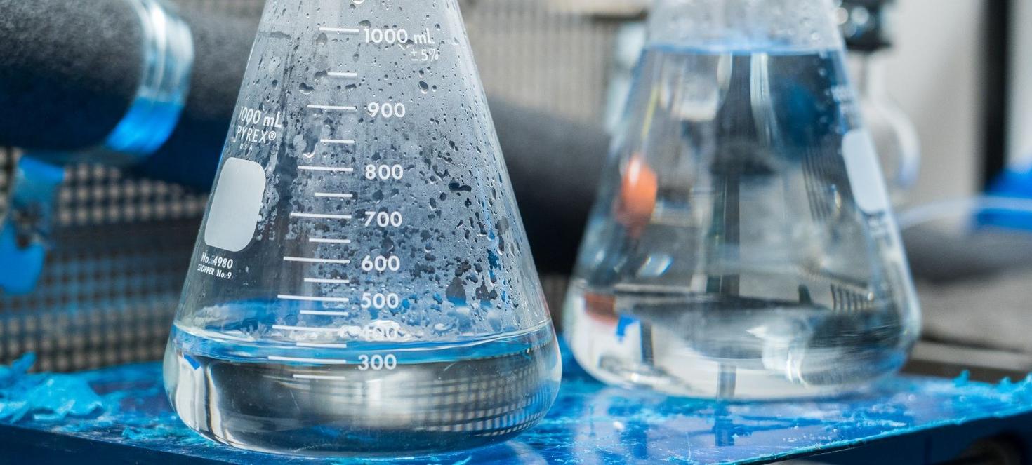 Close up on beaker with liquid samples