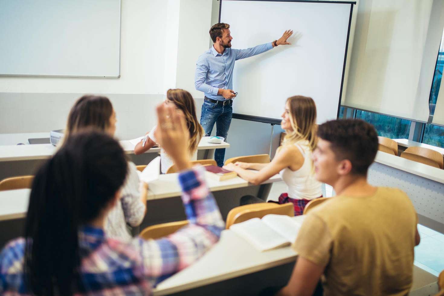 professor teaching to a class of students