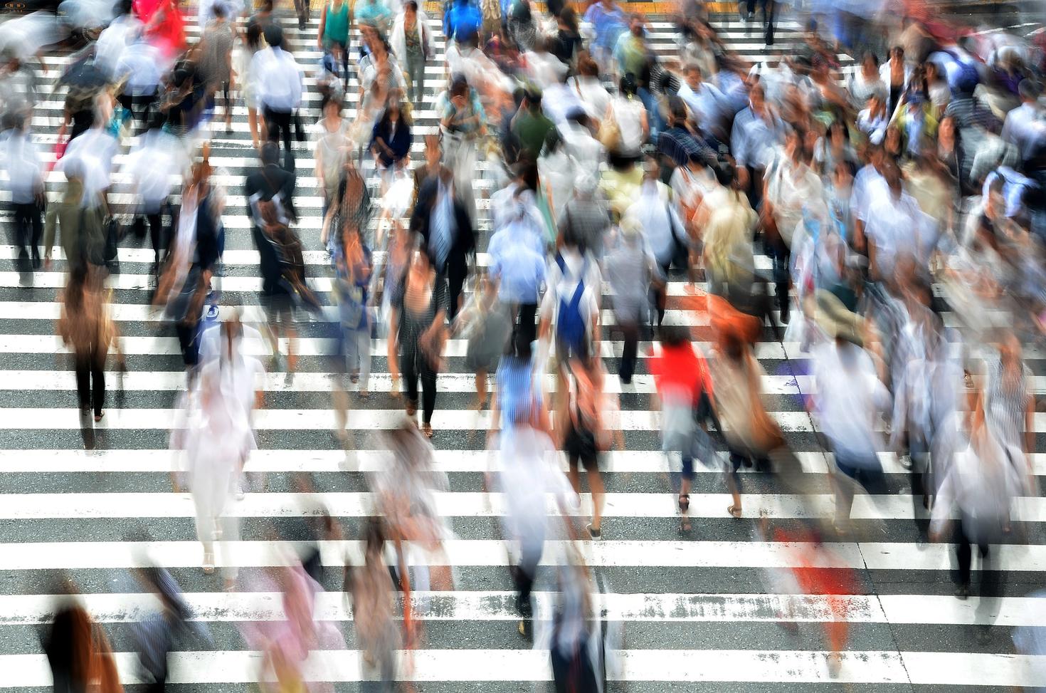 people walking in the city street