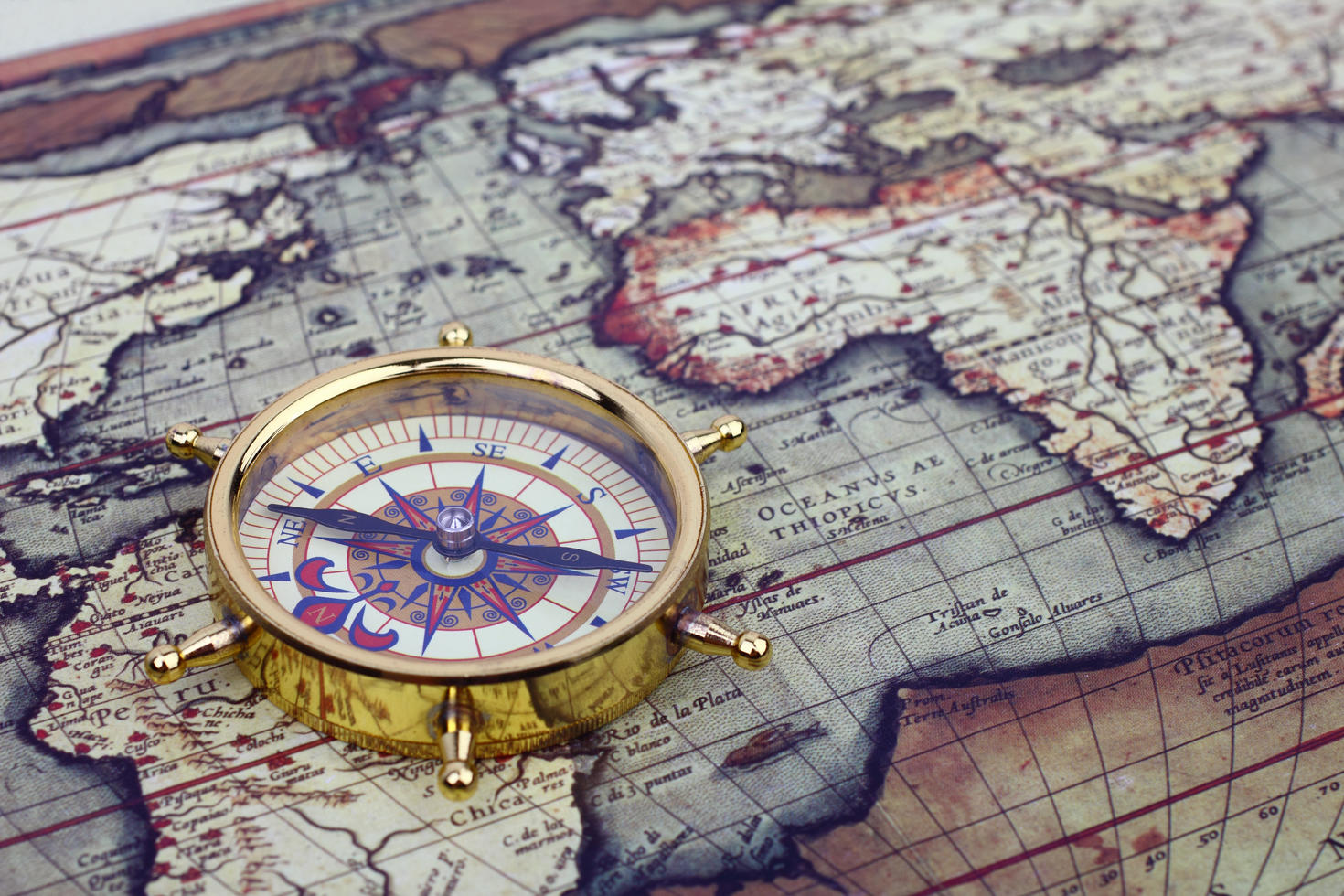 Old world map with compass.