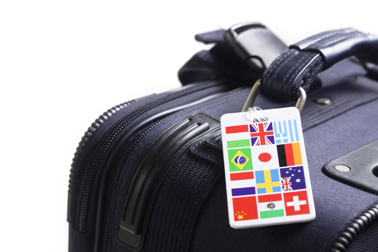 Suitcase with identification tag of world flags.
