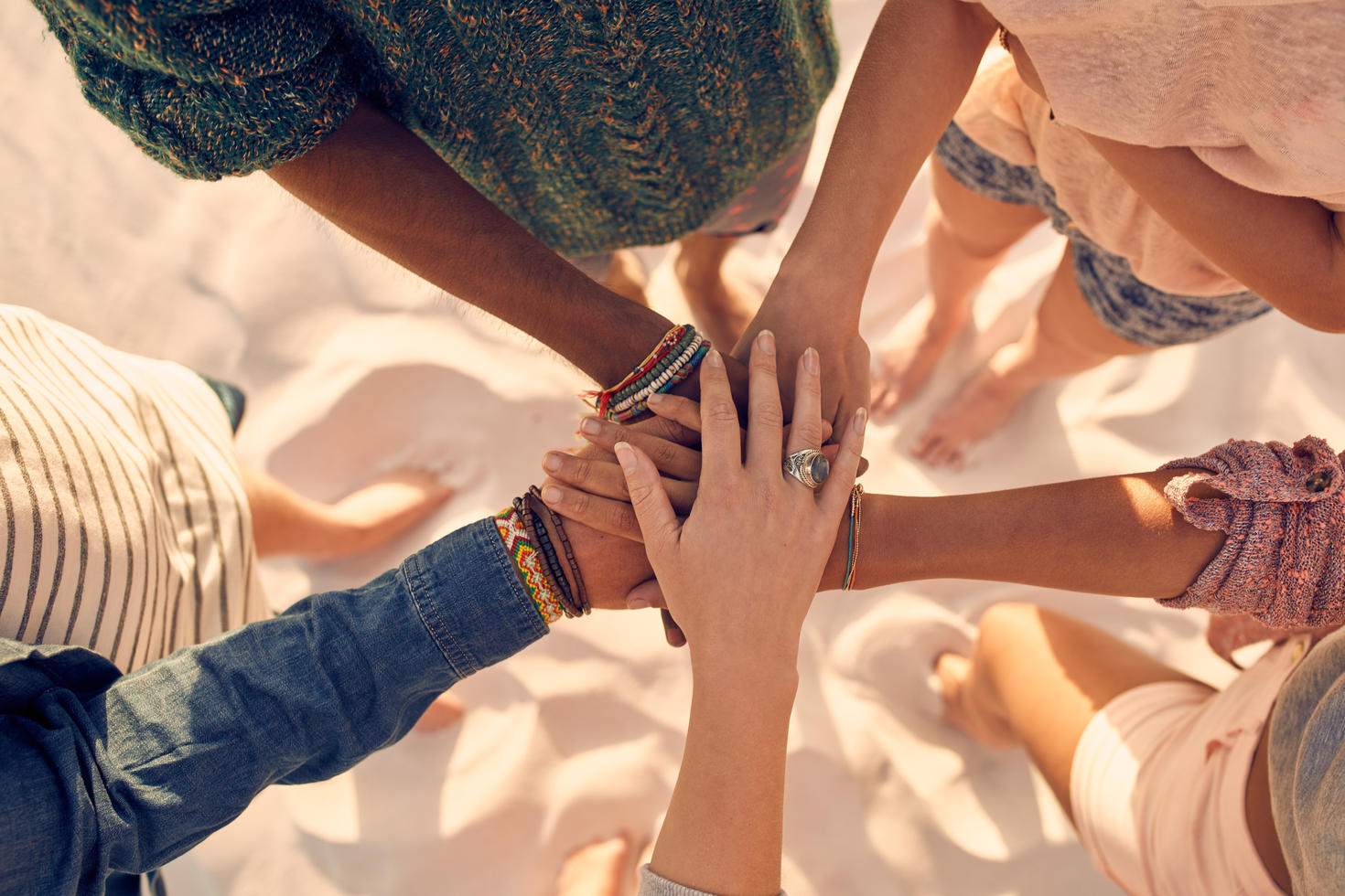 Young men and women showing unity