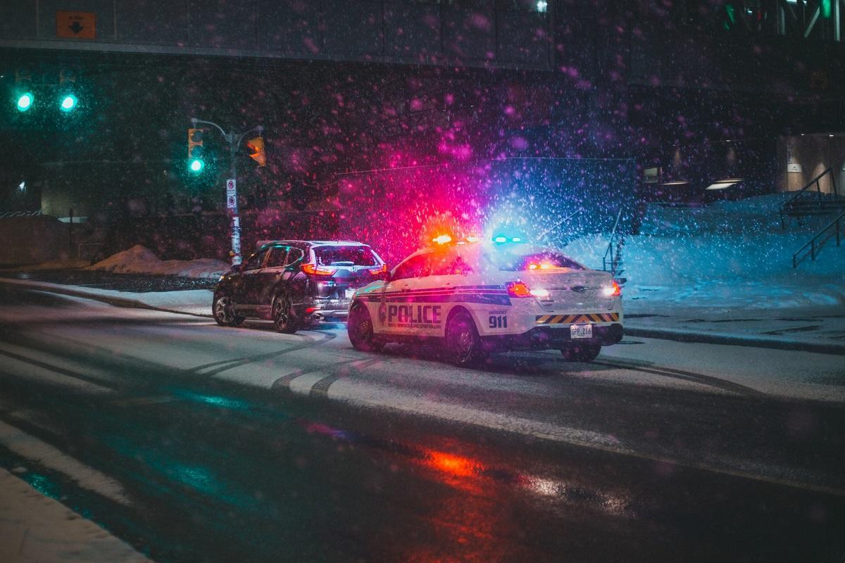 Police pulling over an individual car