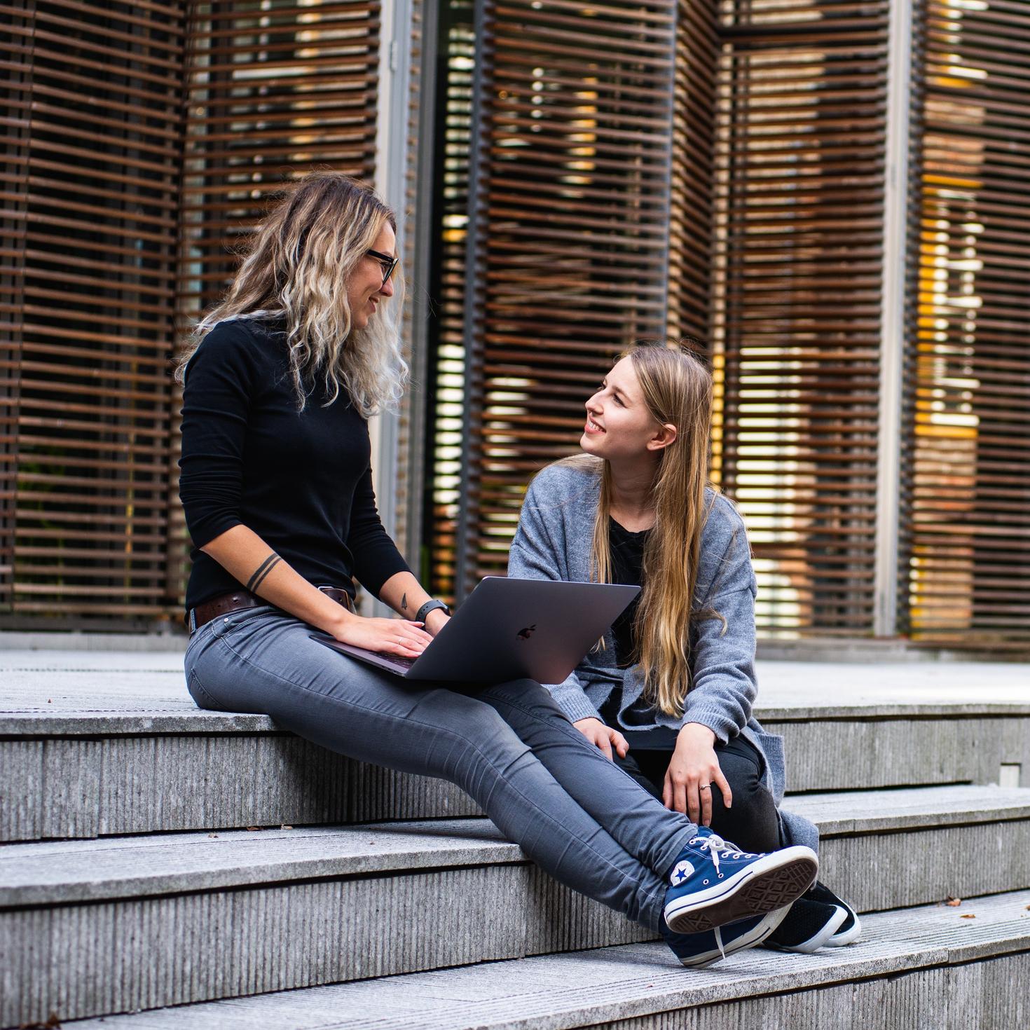 Students sitting on steps