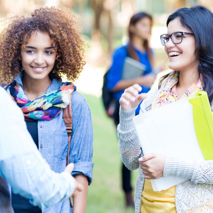 two students smiling