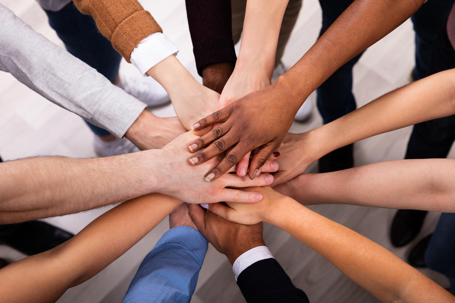 Joined hands expressing diversity and solidarity.