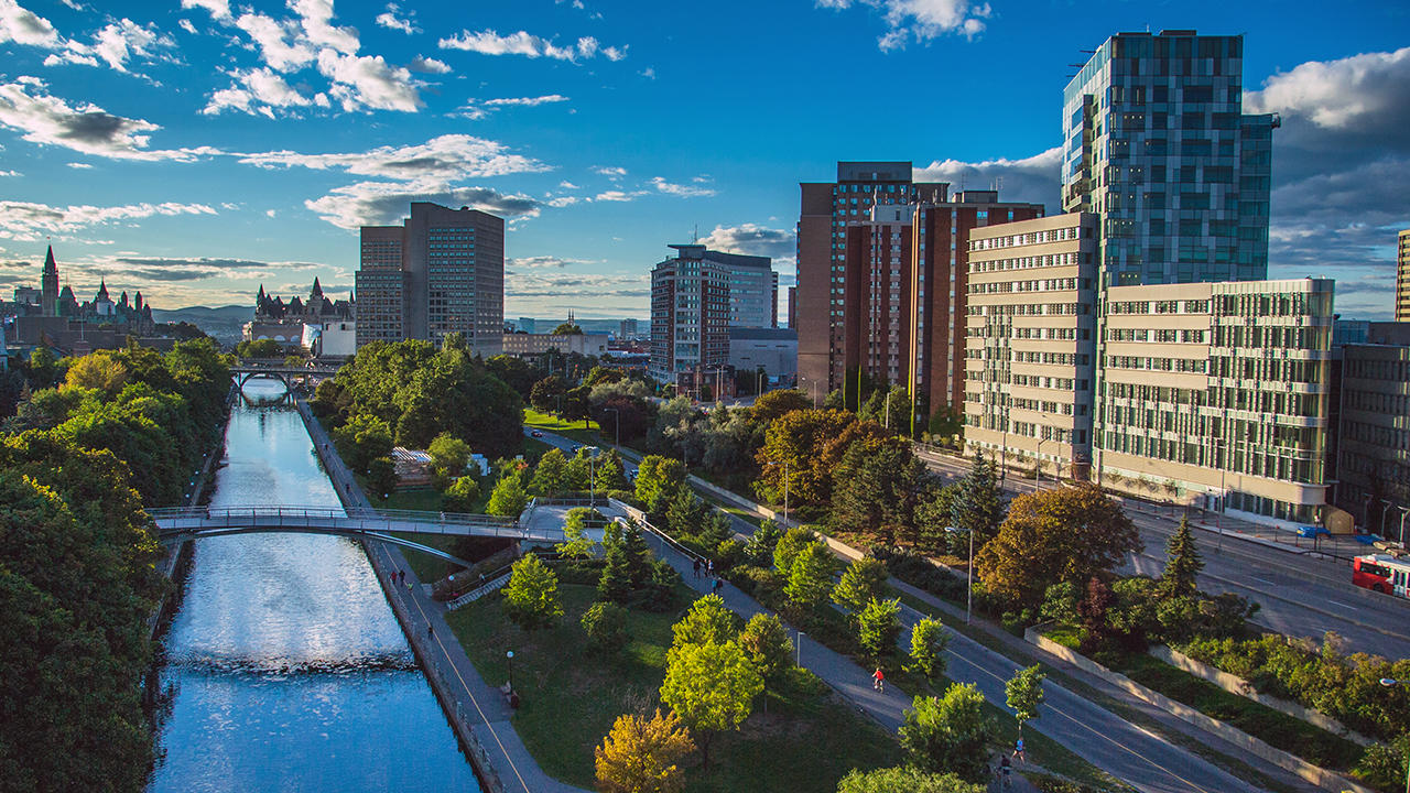 Aerial view of the Faculty of Social Sciences building, with the Rideau Canal and green spaces