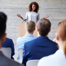 person teaching graduate studies in criminology