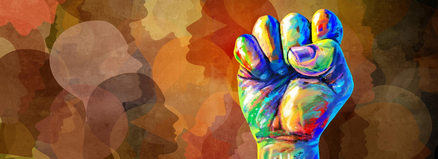 Artwork of colourfully painted clenched fist rising up on a background of layered multicoloured heads.