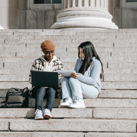 Students sitting on steps