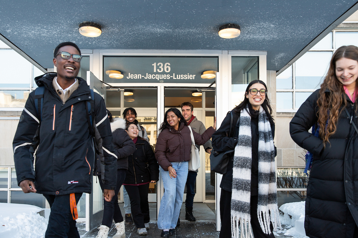 Students walking out of a building