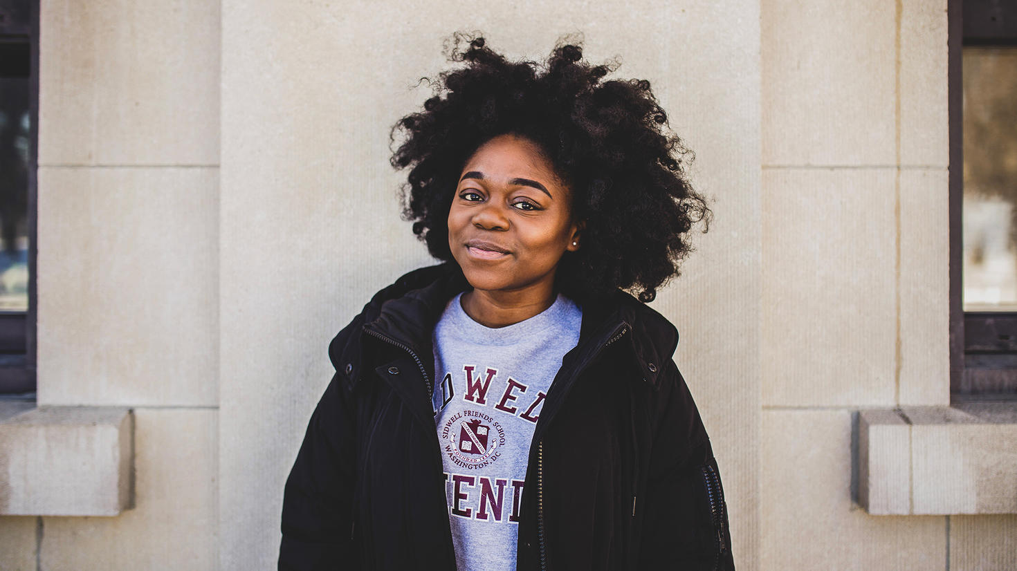 smiling student staring at camera