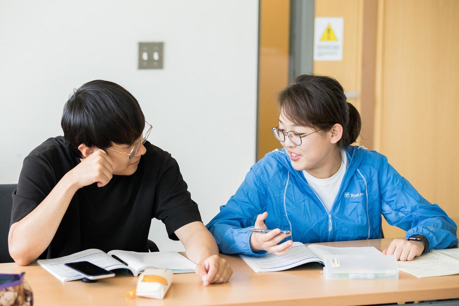 students having discussion in classroom