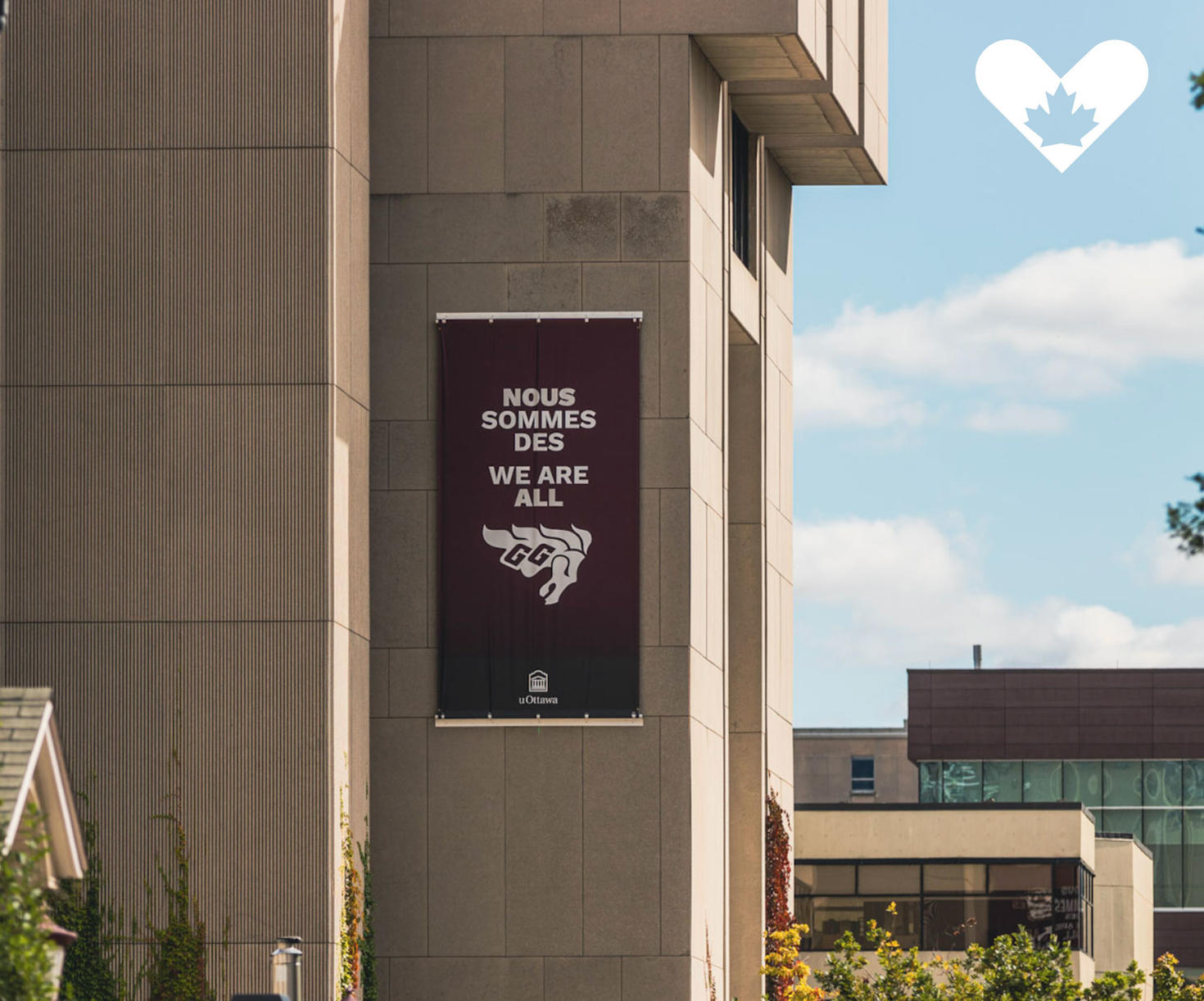 sign on building saying we are all gee-gees