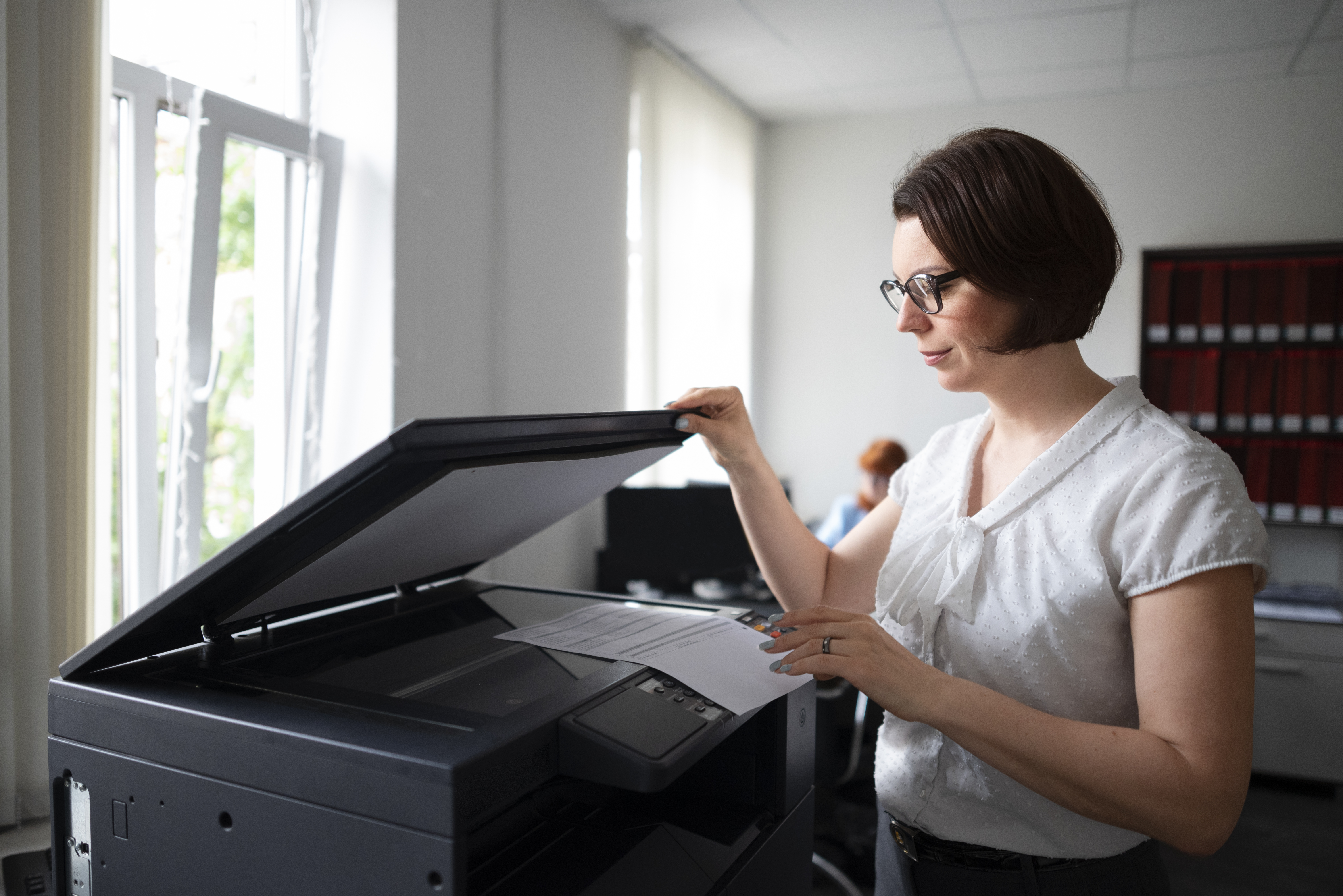 Woman using printer