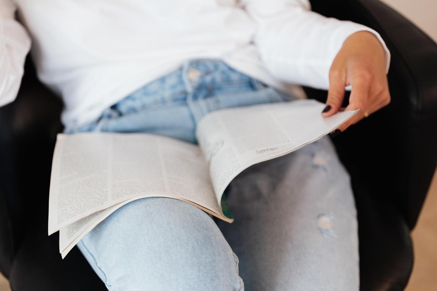 Person reading a journal