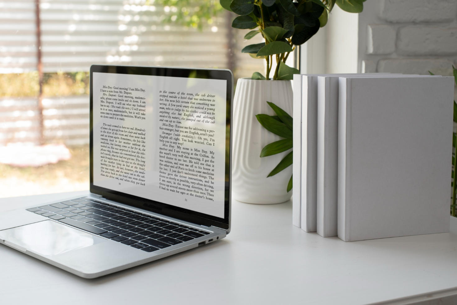 Laptop and books
