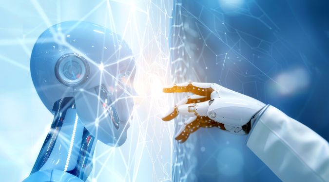 deux robots — l’un étant une tête bleu réfléchissante avec un objectif circulaire, l’autre un bras robotique portant un gant blanc qui le touche délicatement