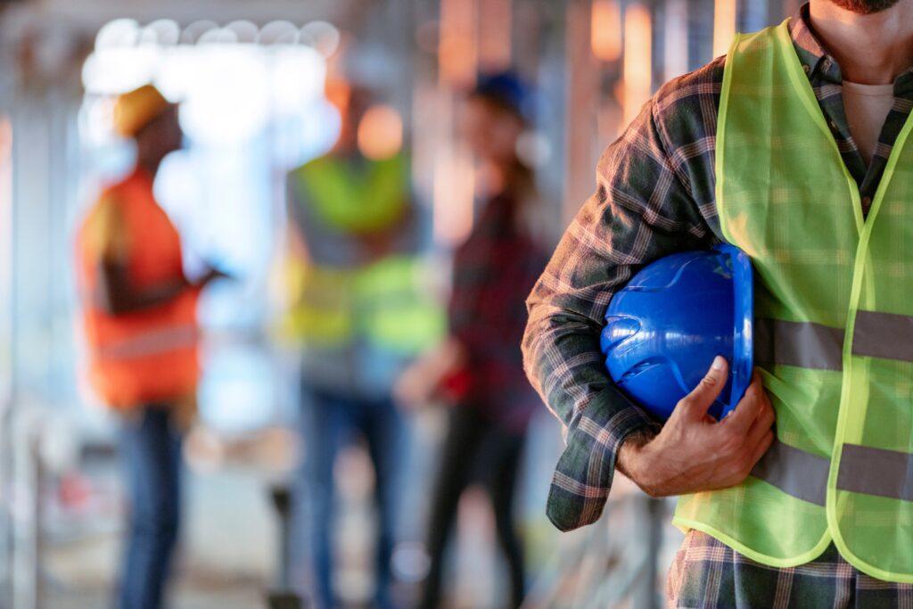 construction working with PPE