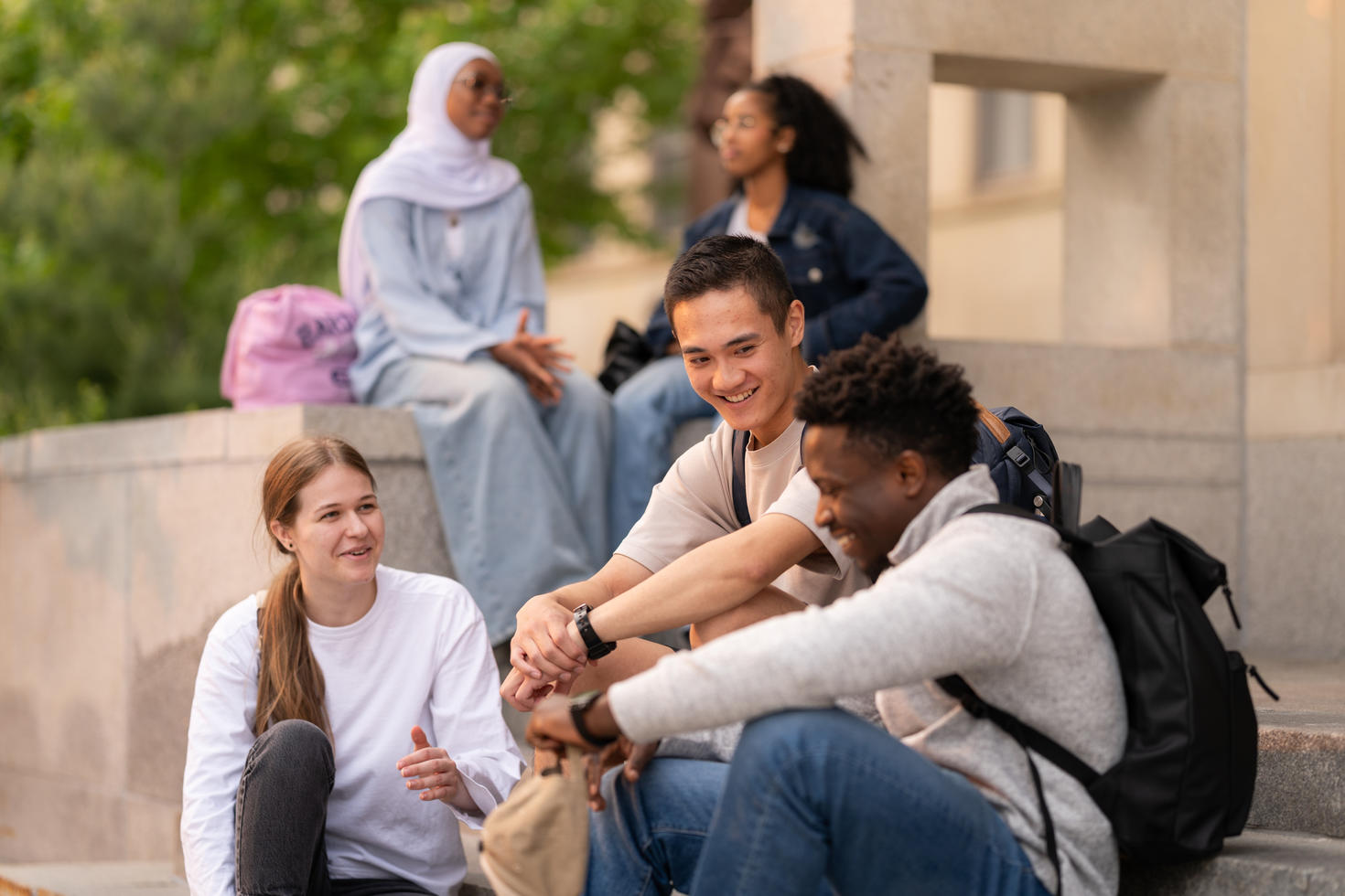 students sitting on the stairs