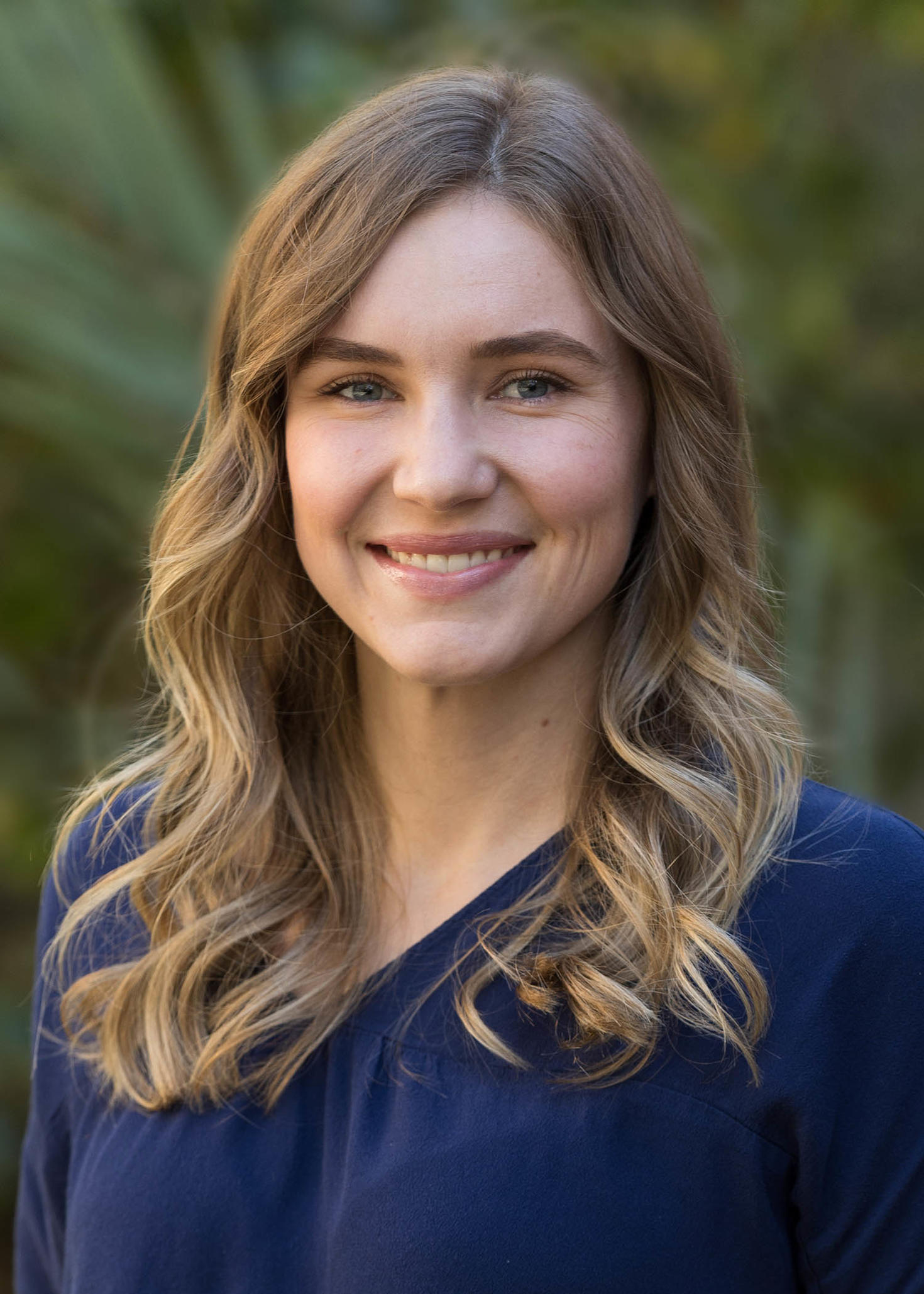 White woman smiling