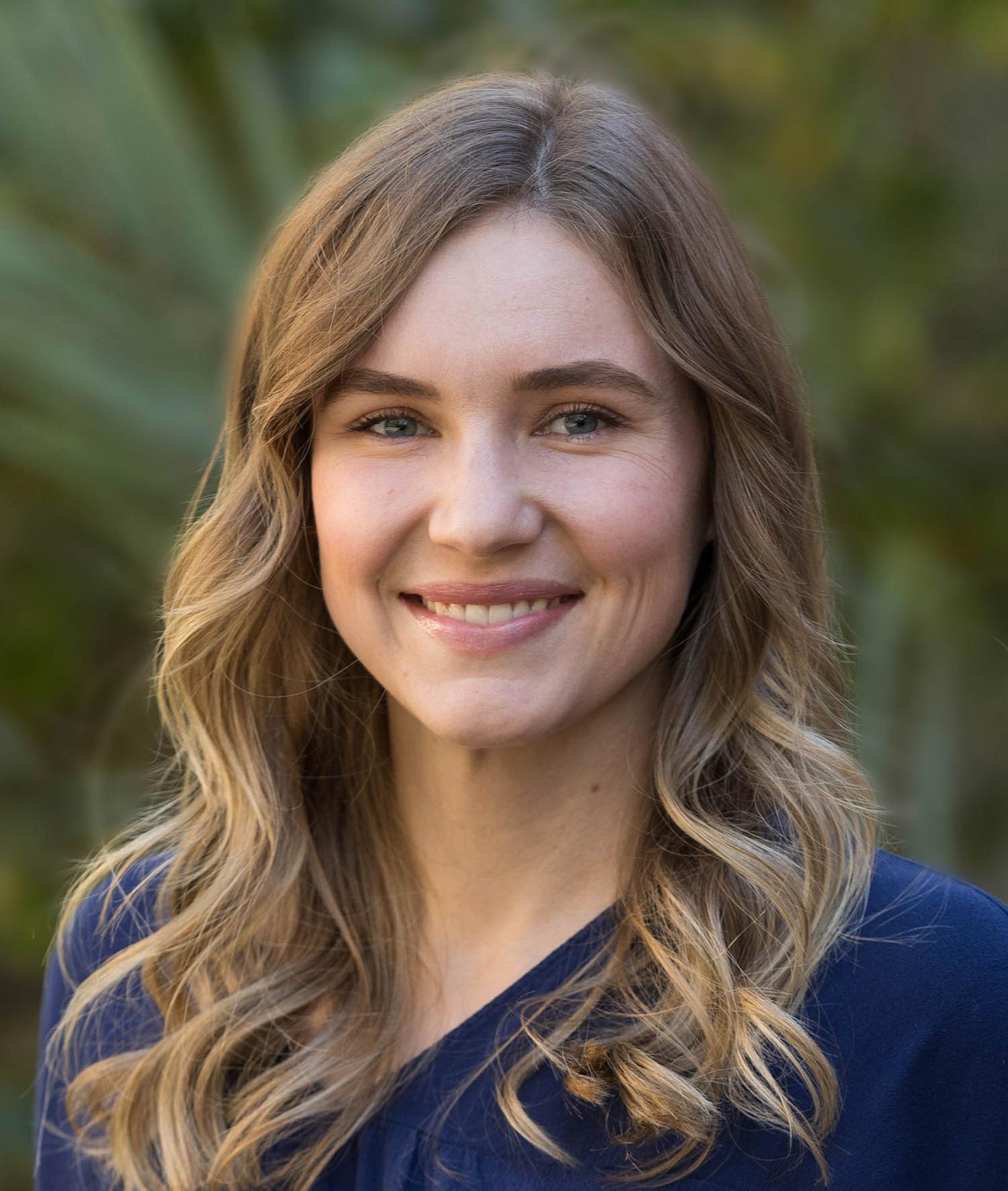 White woman smiling