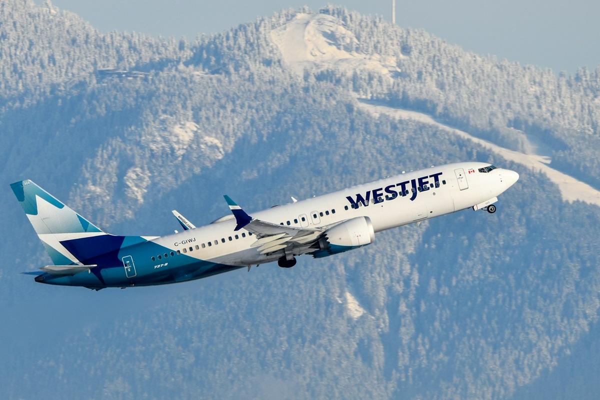 Un avion de WestJet en phase de montée