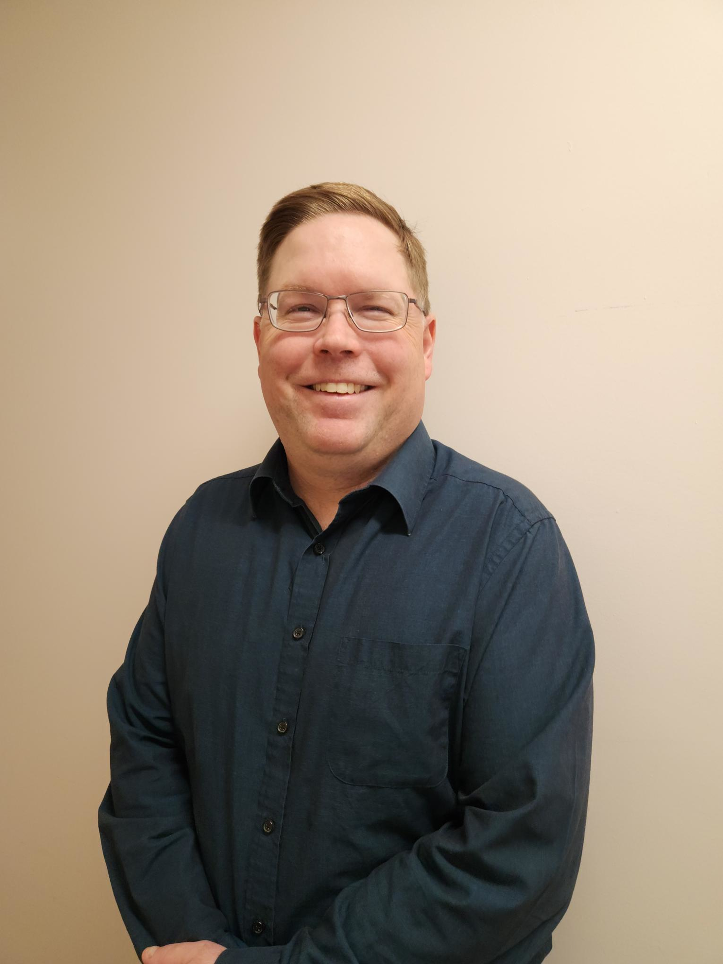 Profile picture of André Lalonde in a blue shirt on a white background