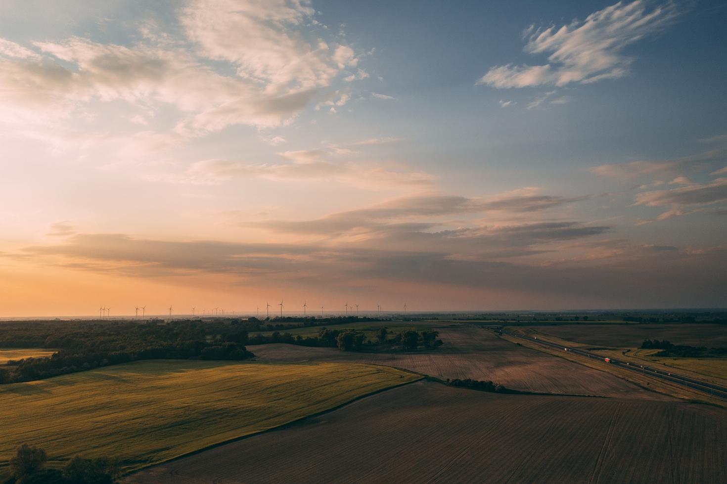 Fields and windmill at sunset