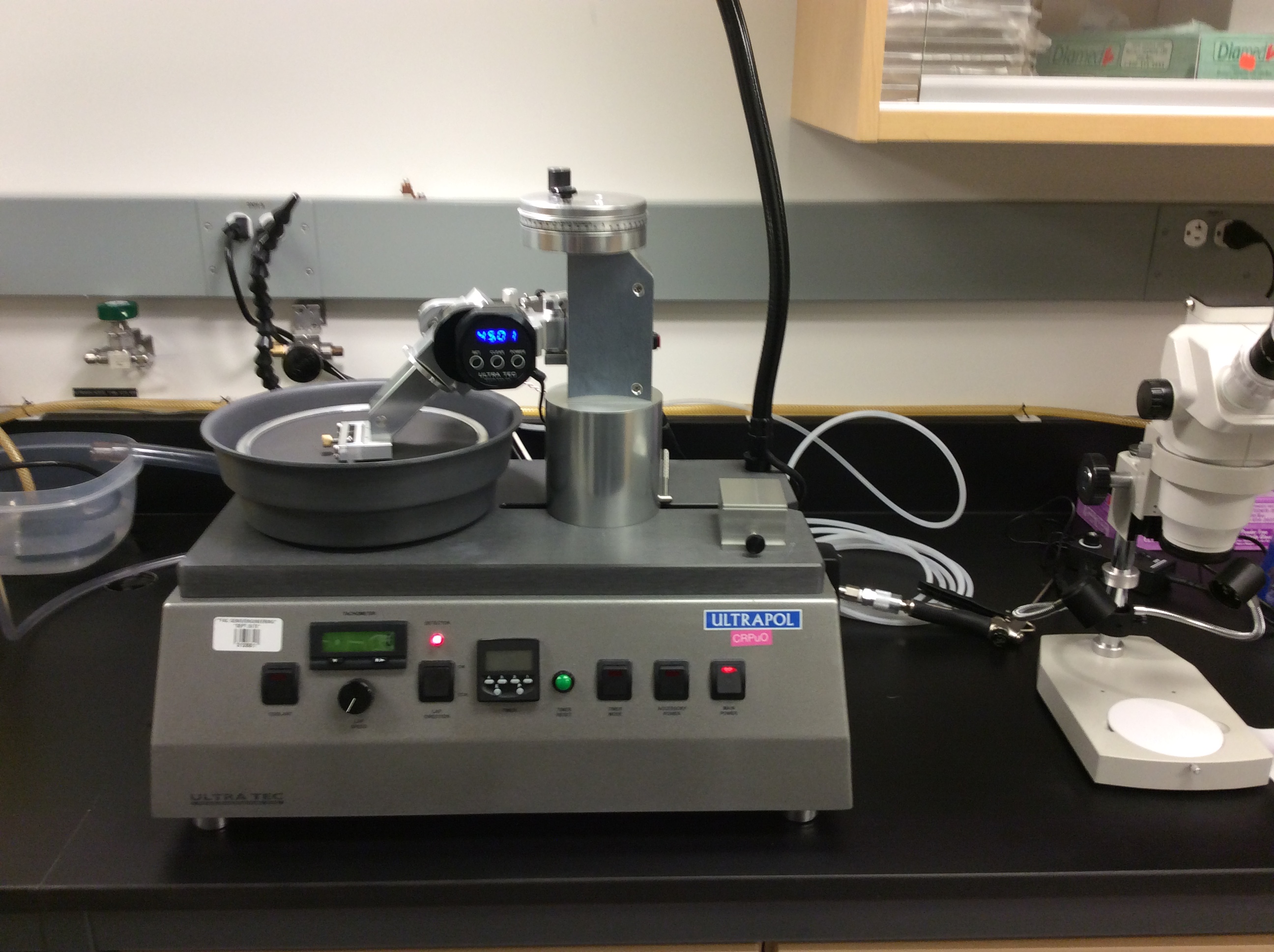 Image of a polishing machine on a lab bench