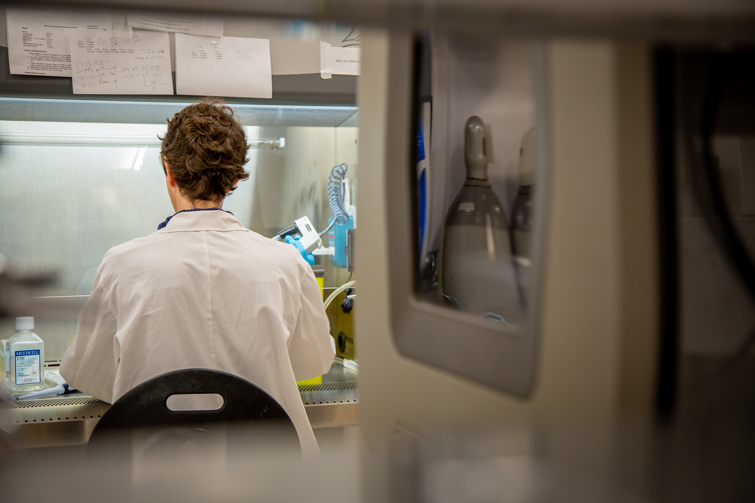 A scientist working in a laboratory.