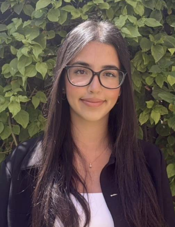 Portrait of a female student smiling.