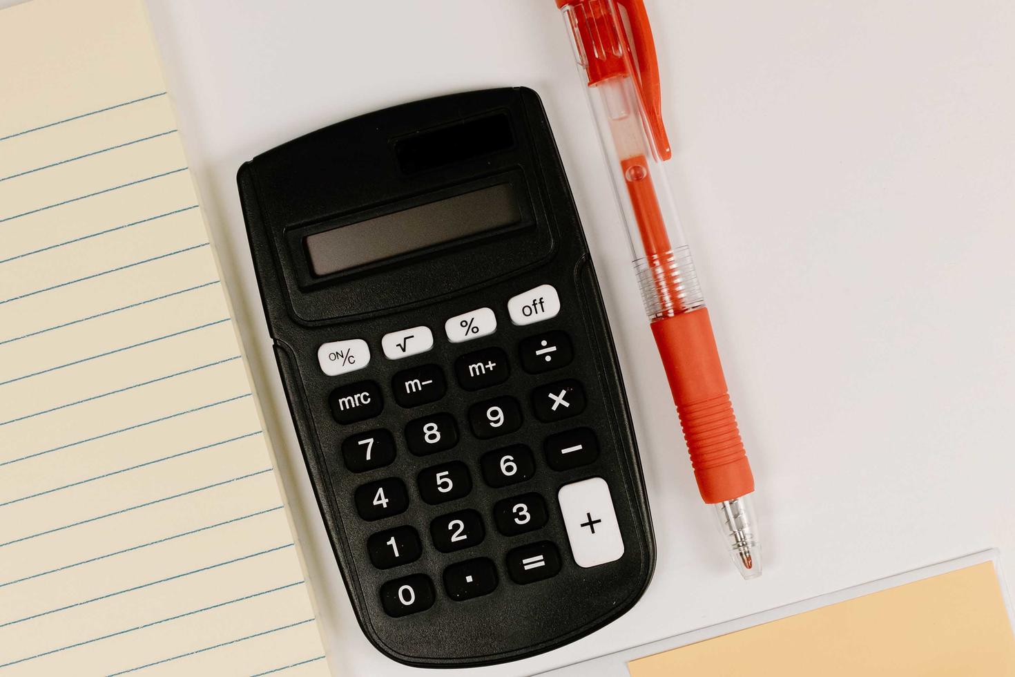 calculator and a pen