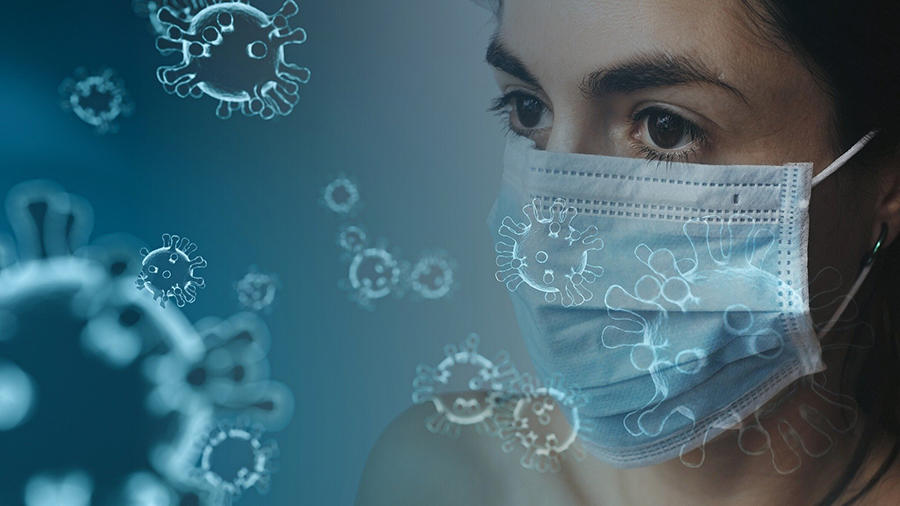 close up of woman wearing a COVID-19 protection mask