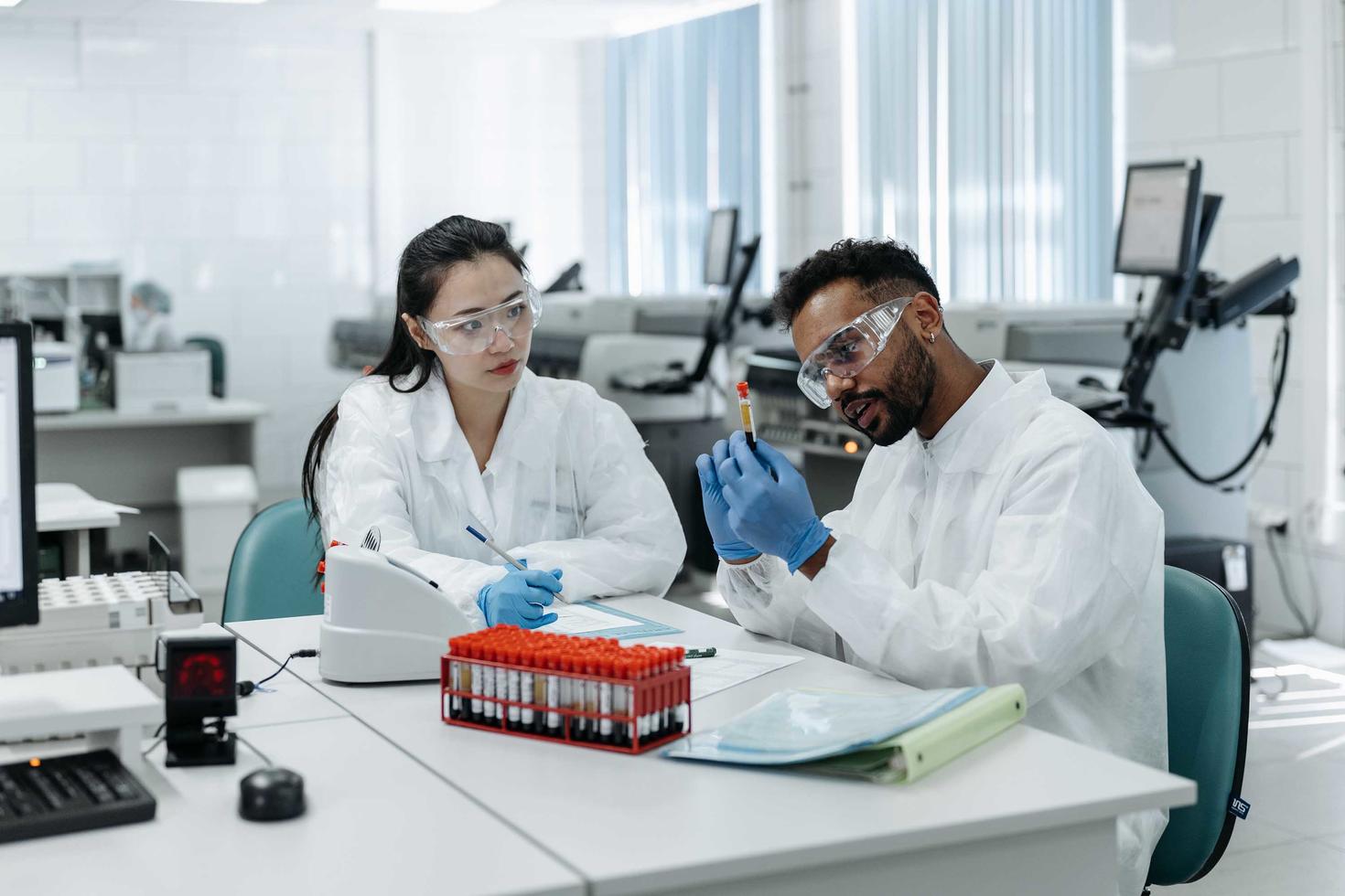 Two researchers working in a lab