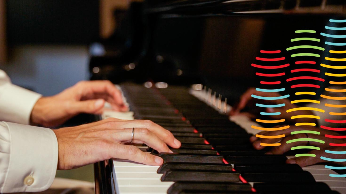 hands on a piano