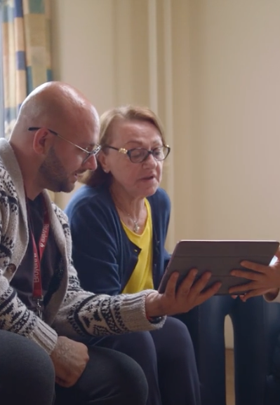 Patients reading report from doctor.