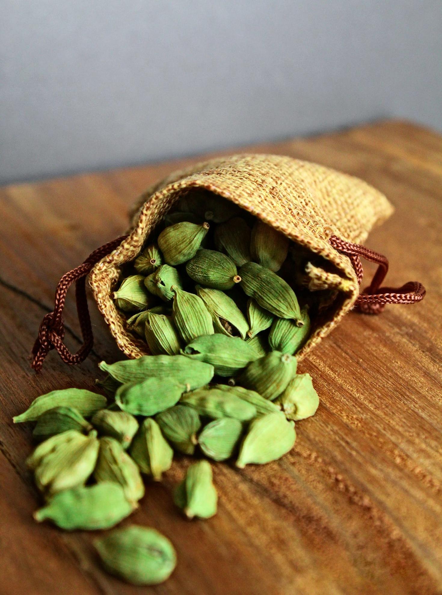 a sac of Green Cardamom