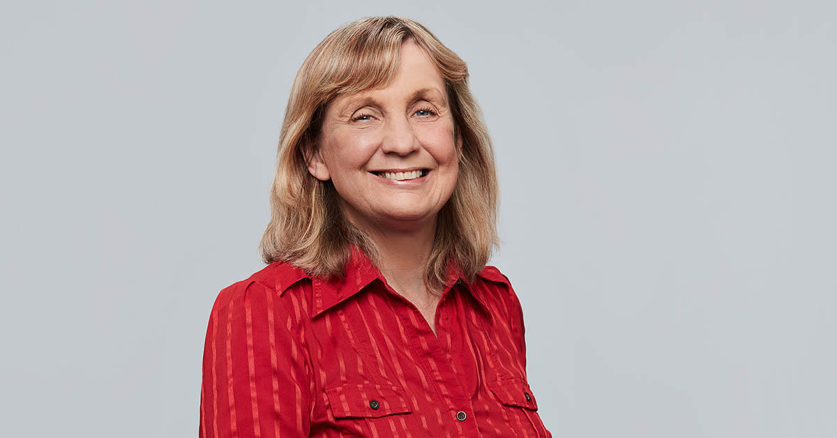 Photo on grey background of Dre. Elizabeth (Betsy) Kristjansson