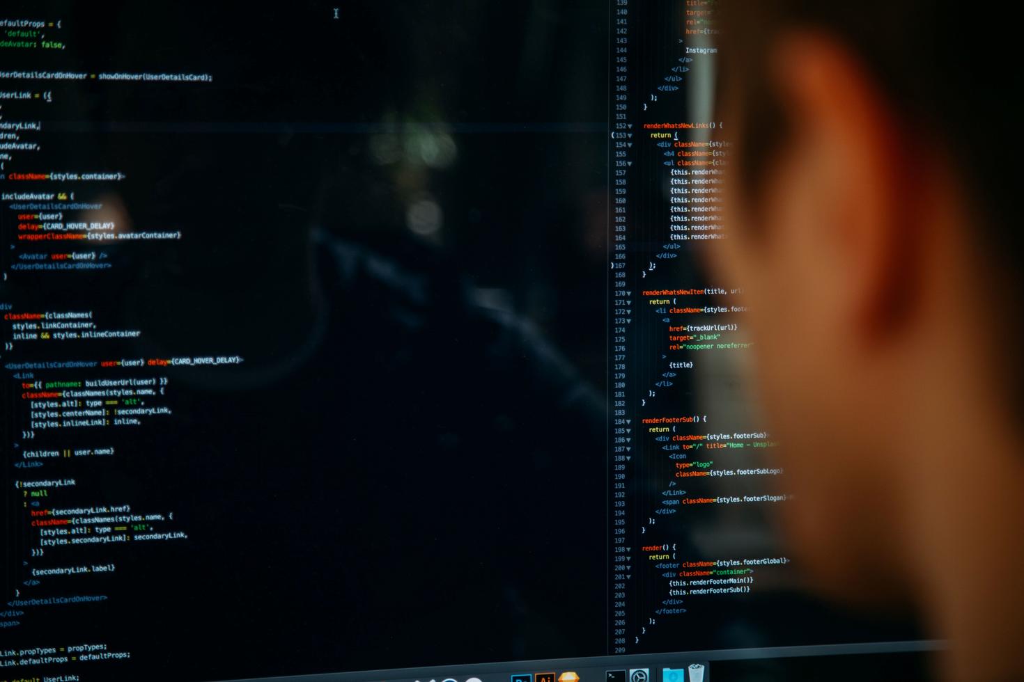 Head's profile reading a screen with data