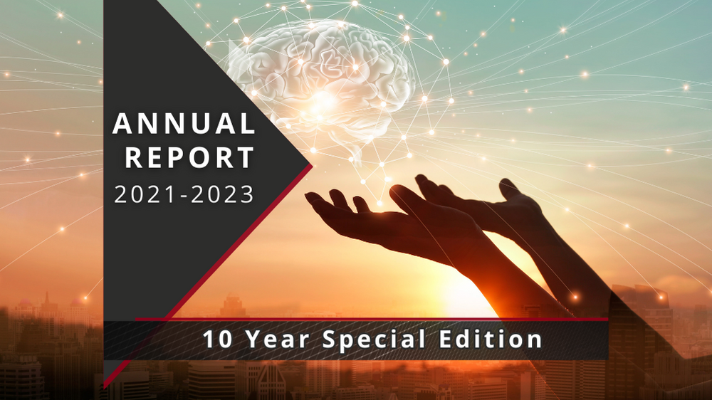 Background image of glowing brain with hands reaching out. Text says "Annual Report 2021-2023. 10 Year Special Edition."