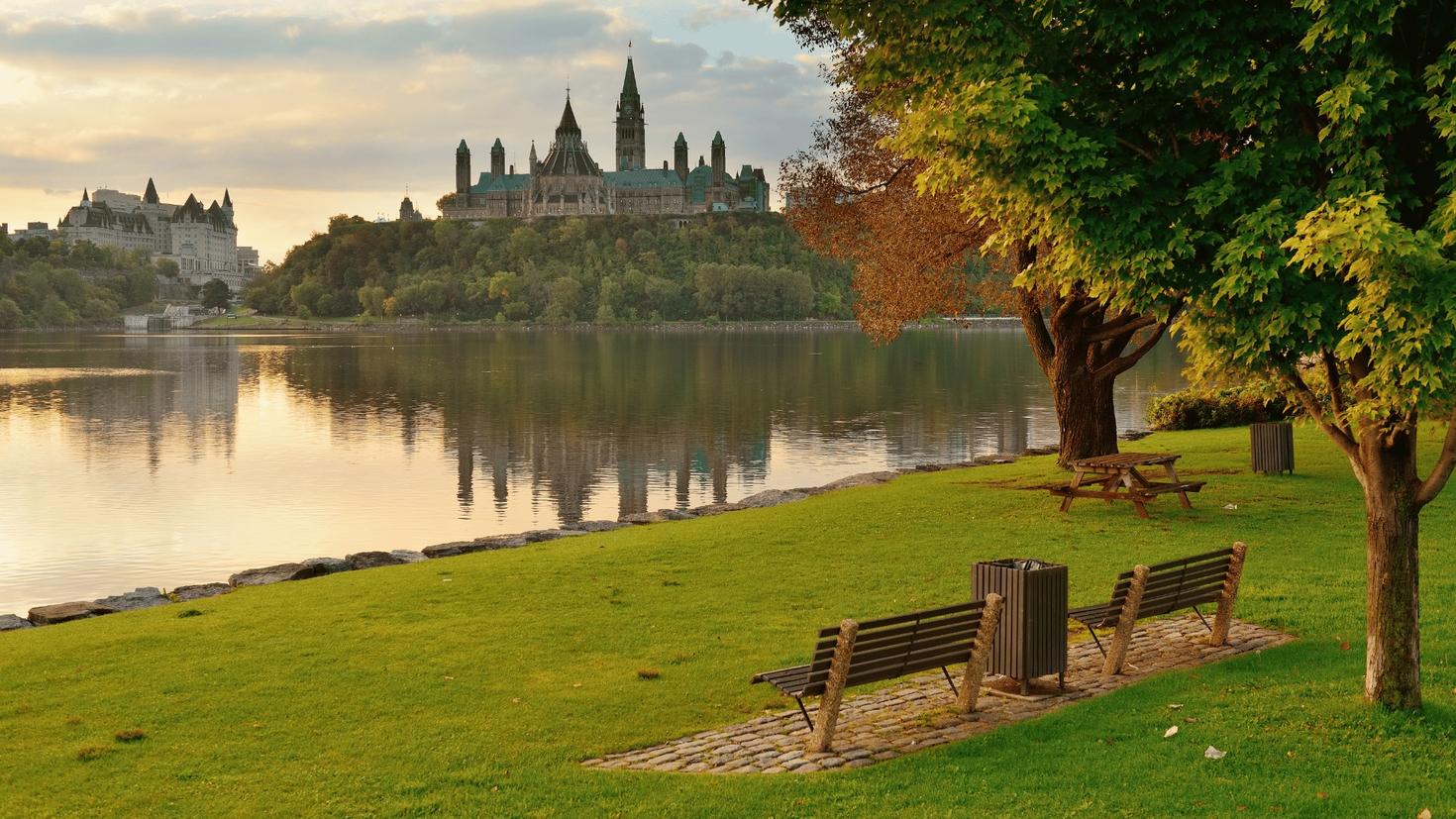 Panoraramic view of Parliament Hill from a park
