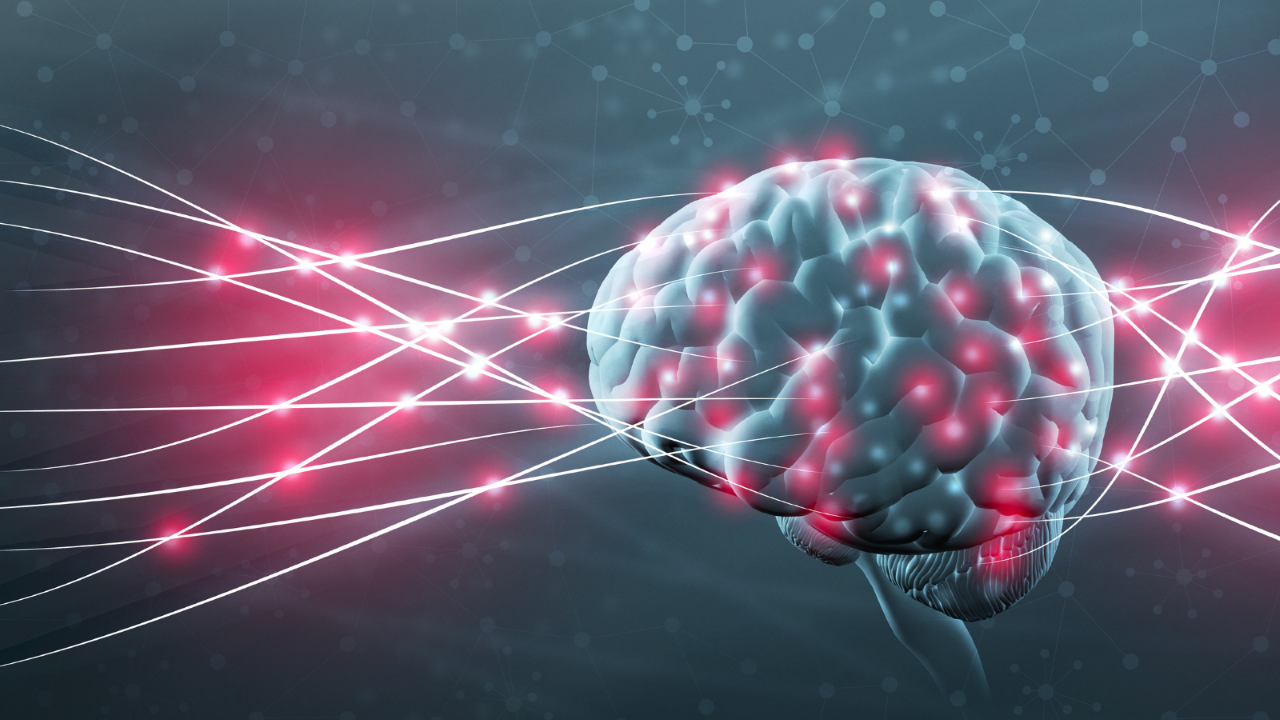 A brain with red lasers dotting the brain.